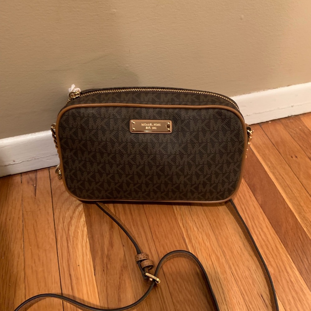 Brand new MK brown and tan small crossbody .